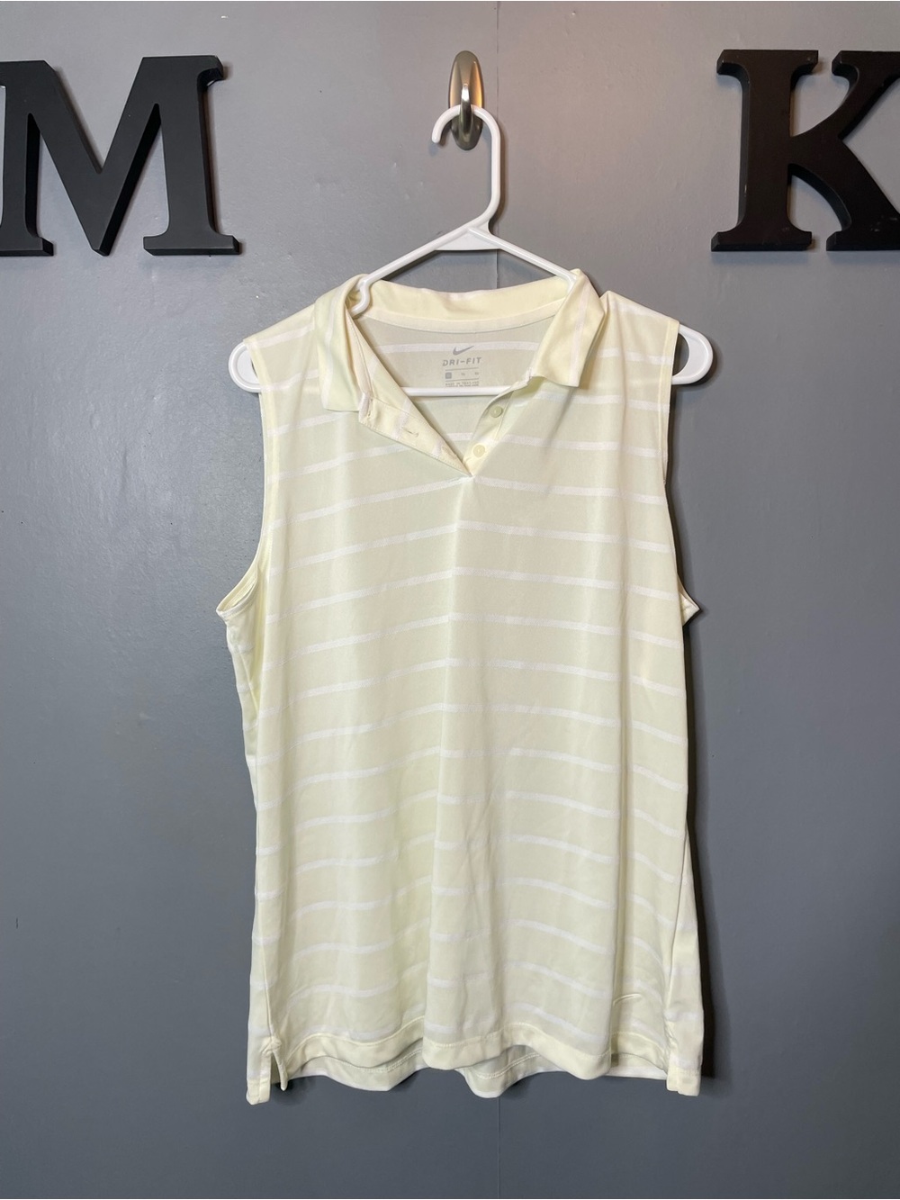 Nike Dri-FIT Women's Golf Sleeveless Polo Top in Pale Yellow size xl